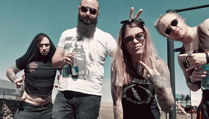 An image of We Kill Cowboys band members.